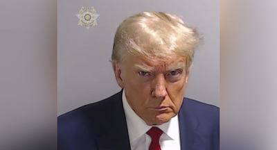 Donald Trump mug shot shows former president scowling at Atlanta booking
