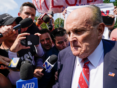 Rudy Giuliani pleads not guilty, won't attend arraignment hearing
