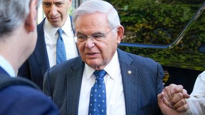 Menendez ordered to turn over personal passport at arraignment