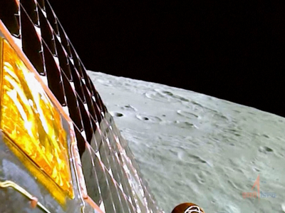 India's lunar rover goes down a ramp to the moon's surface and takes a walk