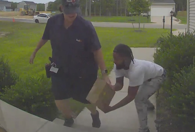 Porch pirate steals package directly from FedEx driver, video shows: 'Never seen anything like that'