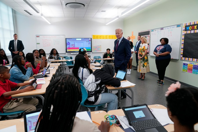 Biden and the first lady drop by a DC middle school math class and lunch to welcome back students