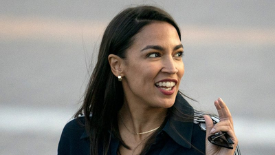 Ocasio-Cortez cruises to victory in New York