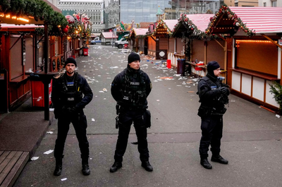 Germans mourn attack on Christmas market with no answers about why