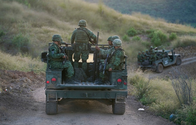 Blast kills 2 Mexican soldiers and wounds 5 others in suspected booby trap by drug cartel