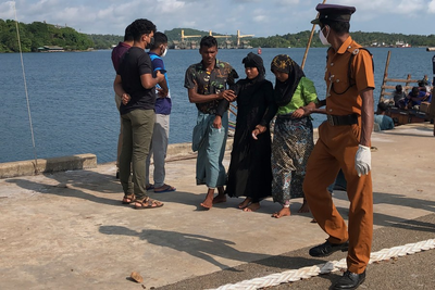 Sri Lanka's navy rescues 102 Rohingya refugees found adrift aboard a fishing trawler