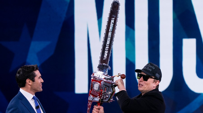 Musk wields chainsaw onstage at CPAC, touting DOGE cuts