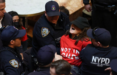 Jewish protesters flood Trump Tower's lobby to demand the Columbia University activist's release