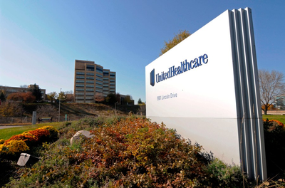 Man arrested outside UnitedHealthcare is now charged with firearms counts and threatening violence