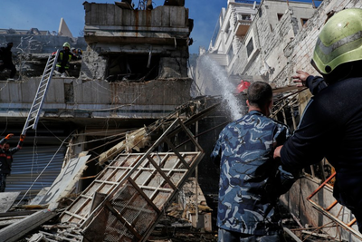 Syrian leader signs constitution that puts the country under an Islamist group's rule for 5 years