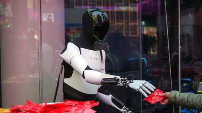 Elon Musk teases a future run by robots