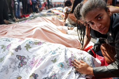 Corpses line Rio street, pushing death toll from police raids to 132