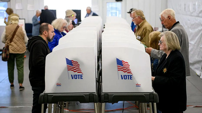 Far-left groups pivot from May Day protests to mobilize voters for 2026 midterms, pushing Dems leftward