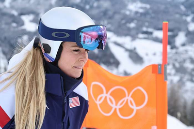 Lindsey Vonn's choice to race Olympic downhill on injured knee questioned after crash