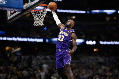 LeBron James breaks NBA mark for games played, Luke Kennard makes winning 3 in Lakers' win vs. Magic