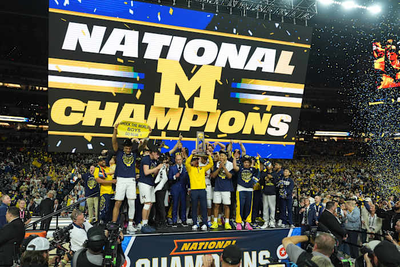 Michigan muscles its way to program's 2nd national title, beating stubborn UConn 69-63
