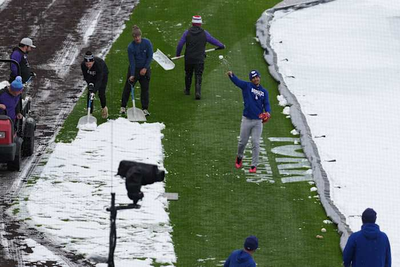 Surprise mid-April snow coats Coors Field as Dodgers-Rockies series gets off to frosty start