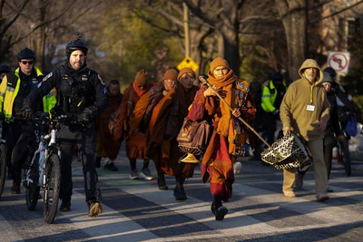 Buddhist monks' 15-week walk for peace ends in Washington, DC