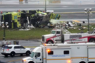 2 pilots killed when jet collides with fire truck at New York's LaGuardia Airport
