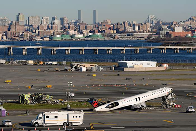 Seconds before LaGuardia crash, controller cleared the fire truck to cross the runway, NTSB says