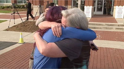 North Carolina woman who vanished 24 years ago tearfully reunites with daughter outside court
