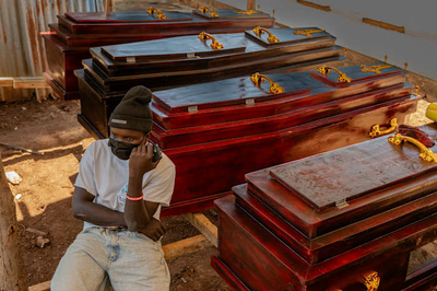 Congo suspends funeral wakes and big gatherings in Ebola outbreak, as WHO upgrades risk assessment