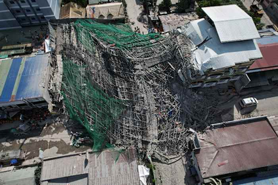 Building under construction in Philippines collapses, leaving 1 dead and 21 trapped