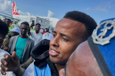 Somali World Cup referee denied entry to US arrives home to hero's welcome