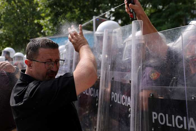 Albanian police use tear gas and pepper spray as Tirana protest turns violent