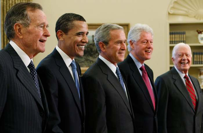 Trump goes unmentioned but not ignored as Clinton, Bush and Obama step up as essayists on presidents