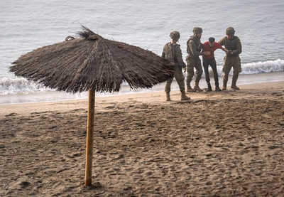 Spain installs sea barrier on Ceuta's border with Morocco after frontier rush that killed 67