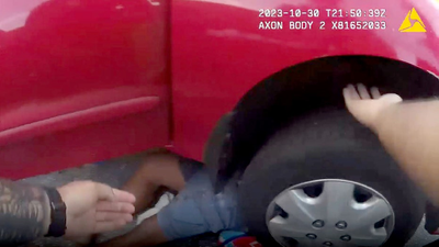 WATCH: Florida police officers lift car off man trapped underneath — 'somebody pull him out!'