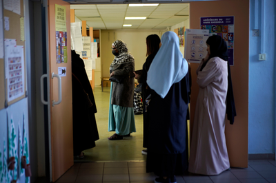 France's education minister bans long robes in classrooms worn mainly by Muslims