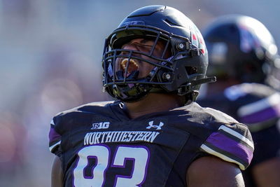 Porter scores two touchdowns and Northwestern beats Purdue 23-15