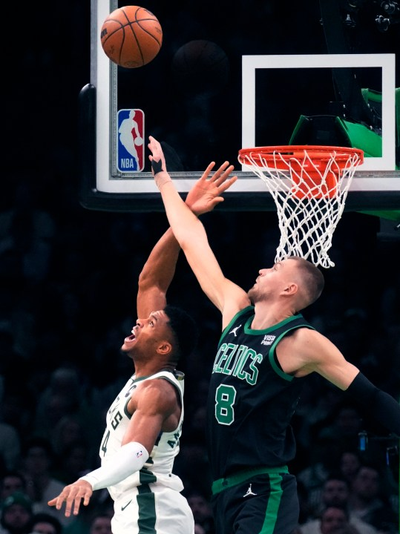 Tatum shakes off illness, helps Celtics slow Giannis and beat fellow East power Bucks 119-116