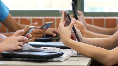 Schools crack down on cellphones, sparking debate on safety and tech use