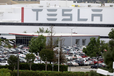 Tesla fined for Fremont worker pinned in car on conveyor belt