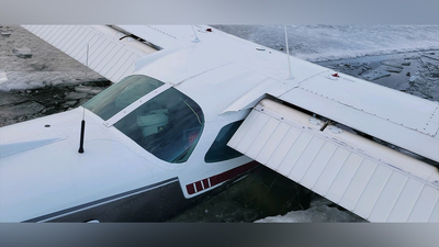 Pilot lands small plane on Minnesota lake, breaks through thin ice
