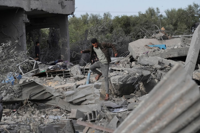 Israel battles militants in Gaza's main cities, with civilians still stranded near front lines