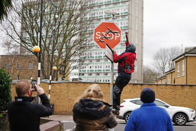 Now you see it, now you don't: Banksy stop sign taken from London street soon after it appears