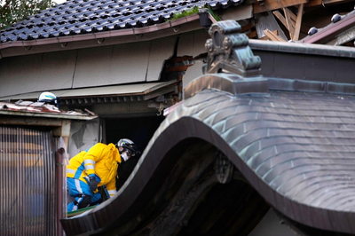 A woman in her 90s is rescued alive 5 days after Japan's deadly earthquake