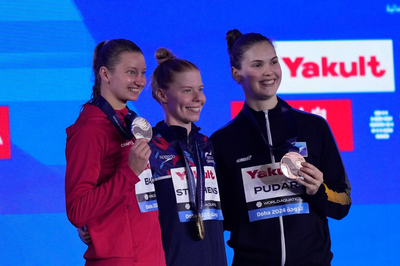 Teenagers shine at World Aquatics Championships as China's Pan, American Curzan take golds