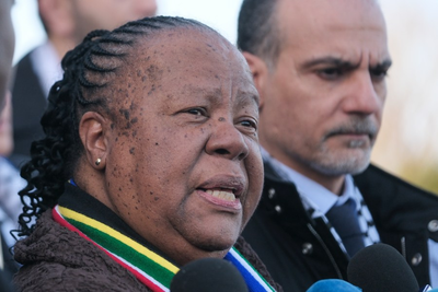 South Africa's foreign minister says citizens fighting with Israeli forces in Gaza will be arrested