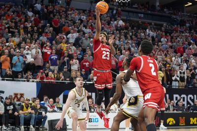 Wisconsin battles to 76-75 OT win over No. 3 Purdue, securing spot in Big Ten championship game