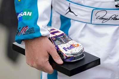 Denny Hamlin wins tire-management NASCAR race at Bristol, his 4th victory at the famed bullring