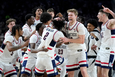UConn concludes a dominant run to its 2nd straight NCAA title, beating Zach Edey and Purdue 75-60