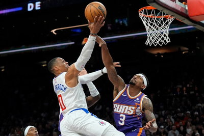 Clippers clinch playoff spot with 105-92 win over Suns
