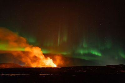Video shows volcano erupting with Northern Lights in background; site of 90s music video
